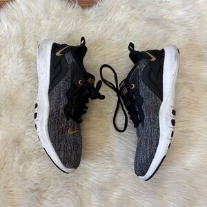 Nike Flex TR9 Black, White, and Gold Running Shoes